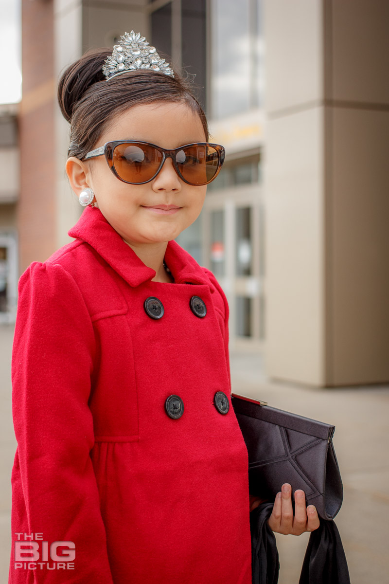 Ava dressed up like Audrey Hepburn in a scene from breakfast at Tiffany's  - kids photography - children's photography