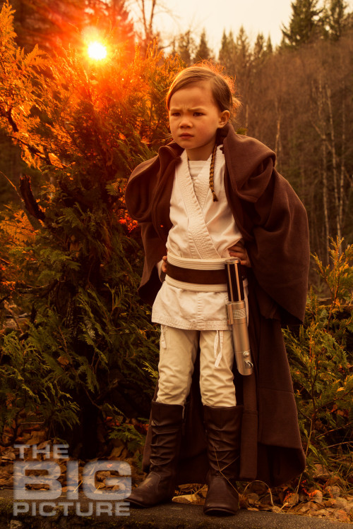 Jade the Jedi, girl padawan standing on Endor with lightsaber and a pensive look on her face, female Jedi, kids cosplay - Children's Photography